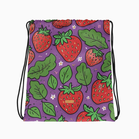 Turnbeutel mit Erdbeermuster auf lila Hintergrund, flach ausgelegt.