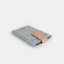 custom eReader cover | with magnetic closure and extra compartment | light gray - tracks | Model "HAKA"